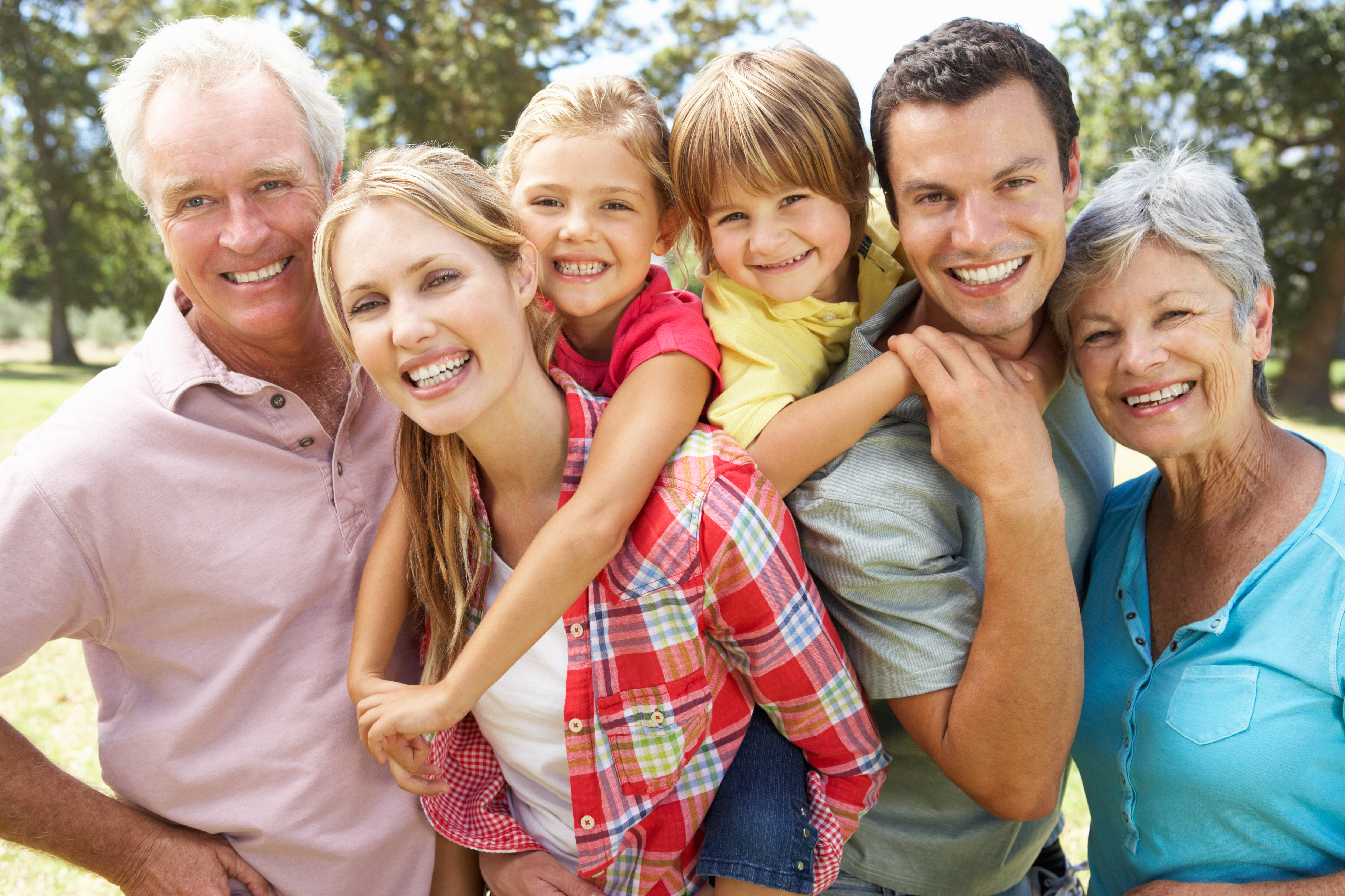 Portrait of multi-generation family having fun outdoors